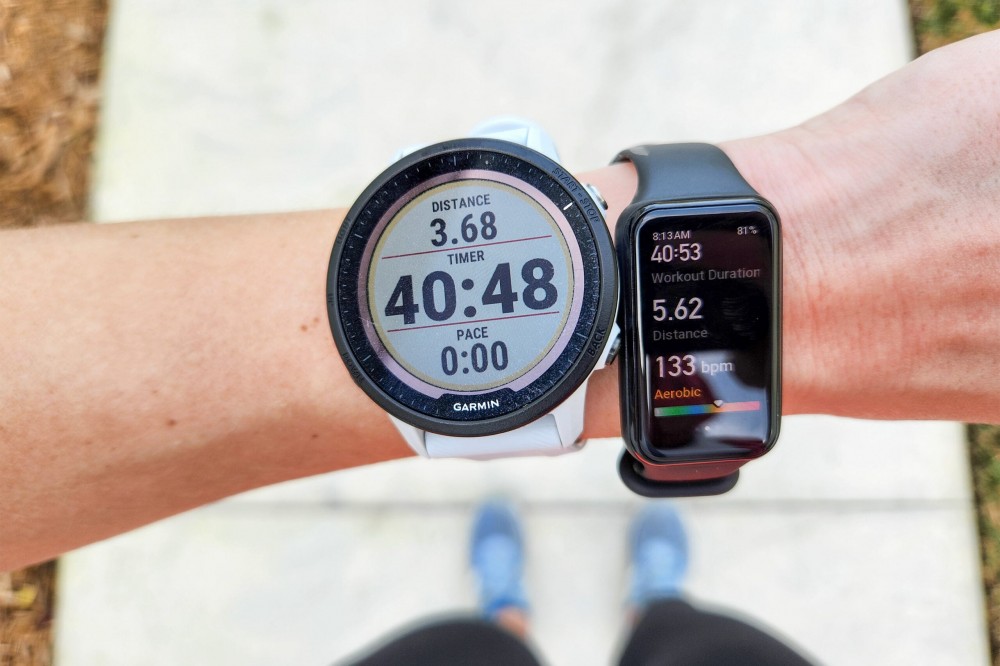 Garmin Forerunner 955 and Amazfit Band 7 watches